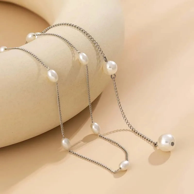 Collier de dos – Voile de Perles