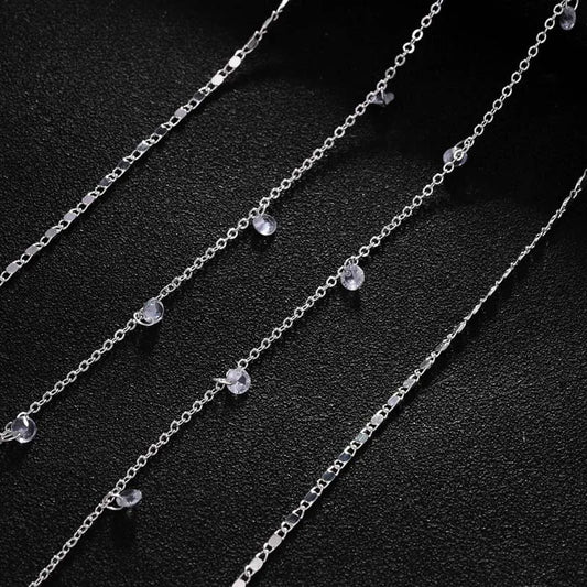 Bijou de corps argenté multi-rangs au design géométrique